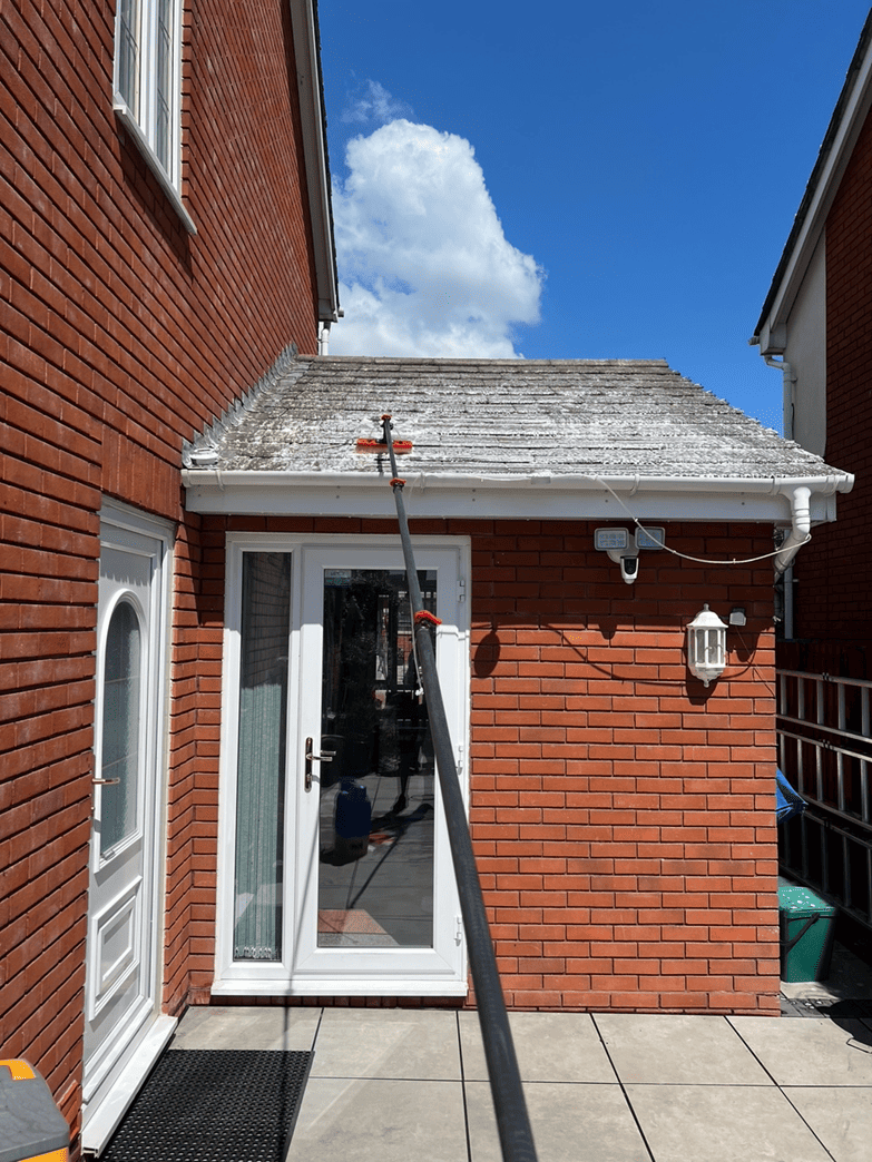 roof cleaning service before/after