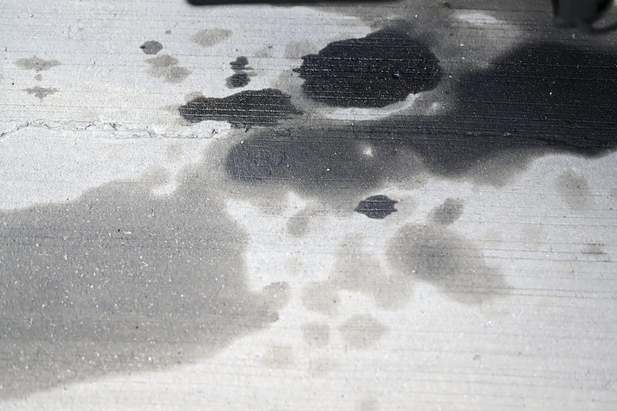 How to Clean a Driveway Oil Stain